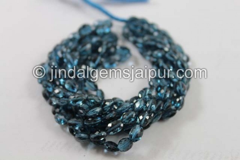 London Blue Topaz Faceted Oval Beads